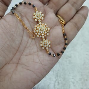 Flower stone bracelet with black diamonds (kattu theega)