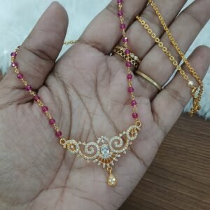 Micropolish pendant with manulu chain