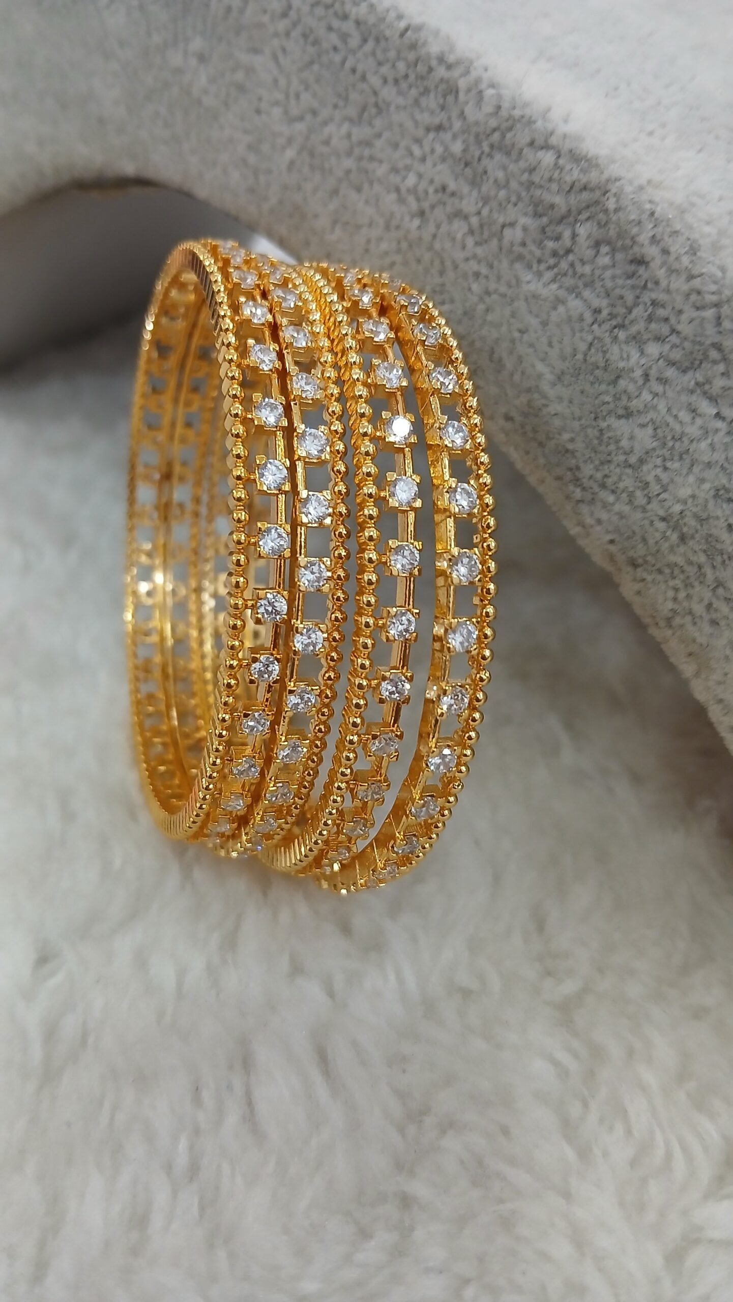 White stpne side frame pattern bangles (set of 4)