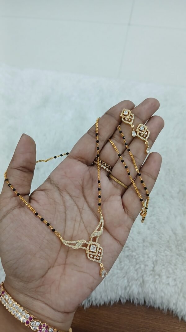 Pendent Triangle Pattern Triangle pattern stones pendant with chain & earrings - Nandhana ...