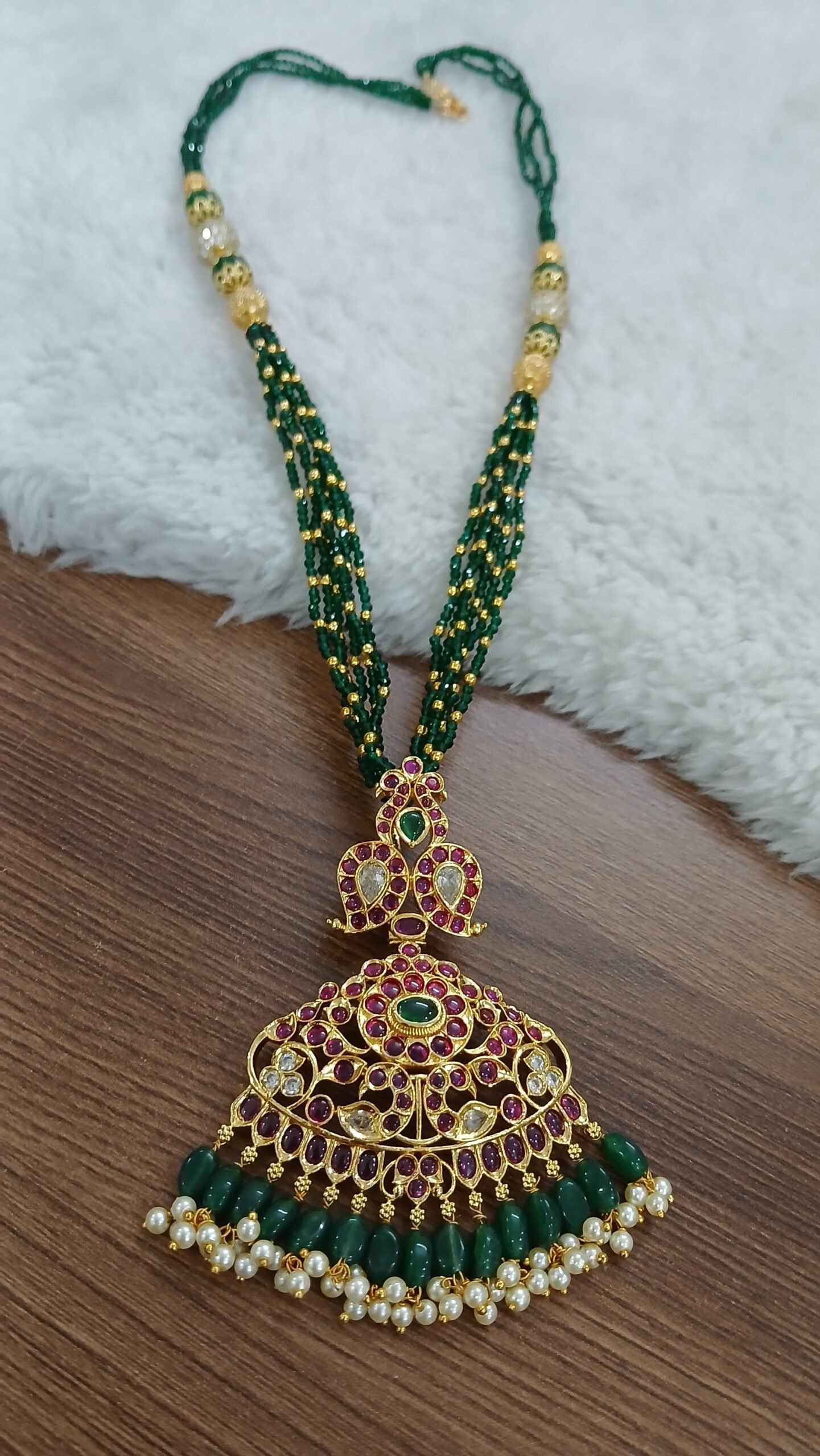 26 inches green beads chain with ruby pendant