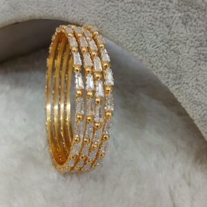 2.6 White glass cut with gold ball Micropolish bangles (set of 4)