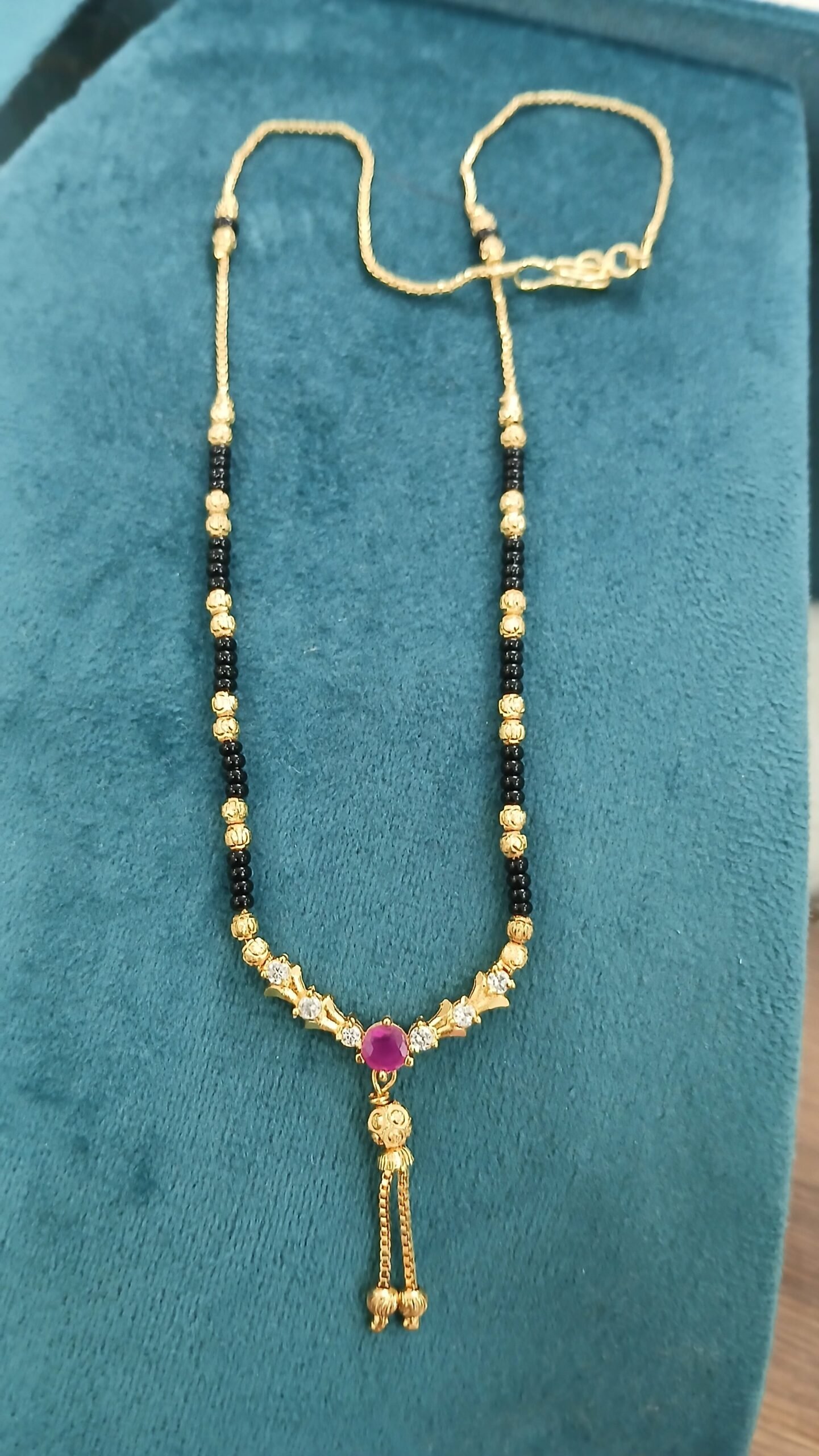 Micropolish boat shape stones pendant with blackbeads