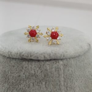 Coral with white snow flake design Micropolish studs