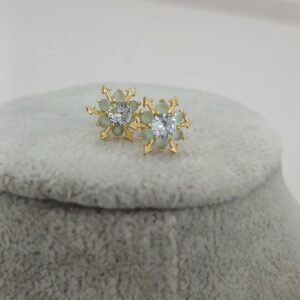 Pastel green with white snow flake design Micropolish studs